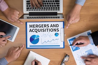 bigstock_M_a_mergers_And_Acquisitions__140661218.jpg