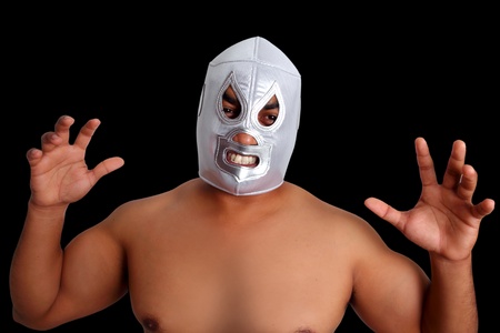 10494000-mexican-wrestling-mask-silver-fighter-with-aggresive-gesture-isolated-on-black.jpg